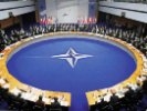 НАТО продолжит бомбить Ливию, несмотря на переговоры о мире