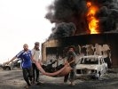 Ливия похоронила Каддафи. В городе, где его убили, мощный взрыв: до 100 погибших. ФОТО