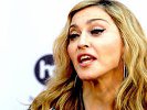 Мадонне запретили посещать сеть кинотеатров из-за переписки во время сеанса