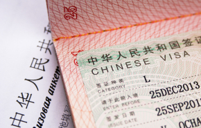 Китай приостановил въезд из России по визам